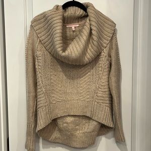 Victoria’s Secret loose turtleneck sweater.